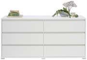 Weißes XL-Sideboard mit sechs Schubladen, dekoriert mit Büchern und Pflanzen, Frontalansicht.