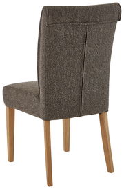 Rückansicht eines gepolsterten Stuhls mit braunem Stoffbezug und Holzbeinen.