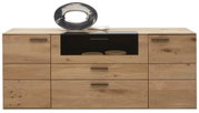 Vooraanzicht van een modern houten dressoir met meerdere lades en vakken, versierd met een zilveren decoratiestuk op het blad.