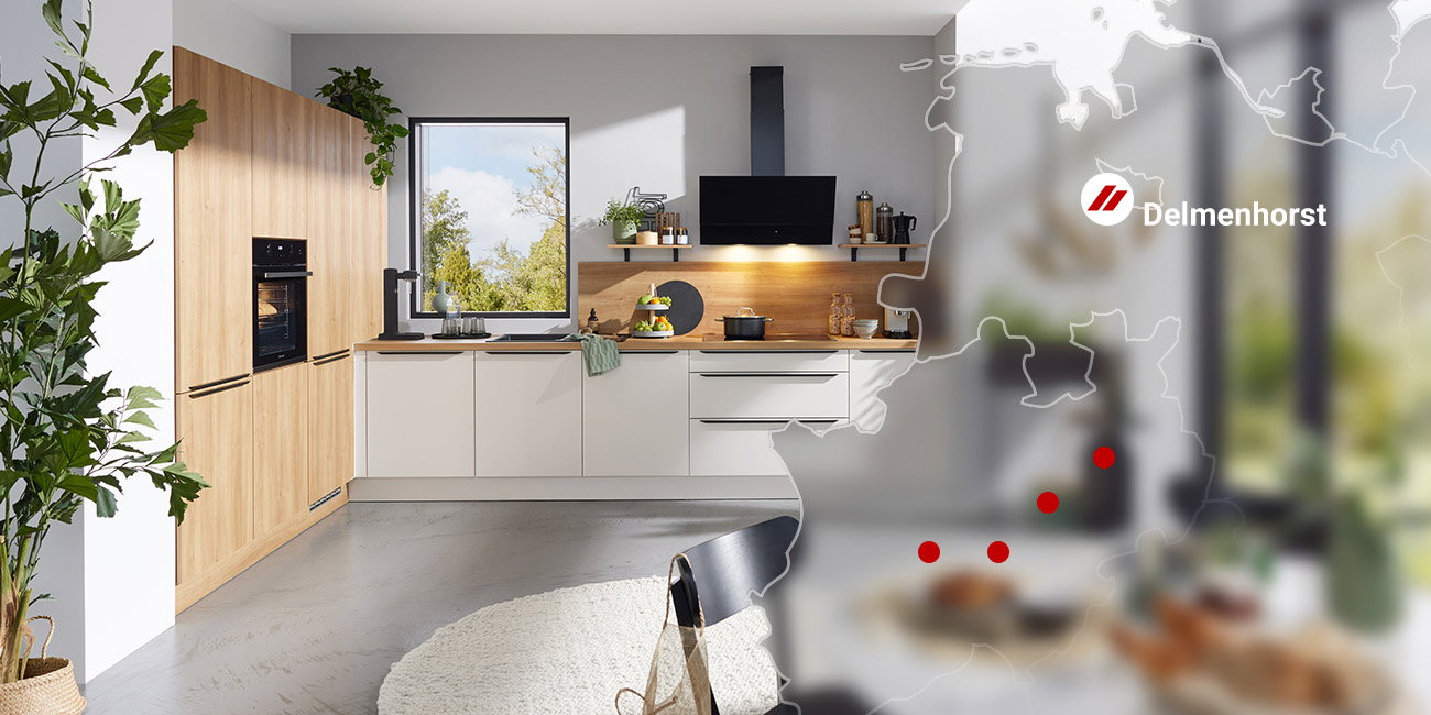 Moderne Küche in Holzoptik mit Deutschlandkarte und markiertem Standort Delmenhorst.