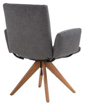 Rückansicht eines grauen Armlehnstuhls mit Holzbeinen, Modell COCOON von Dieter Knoll.