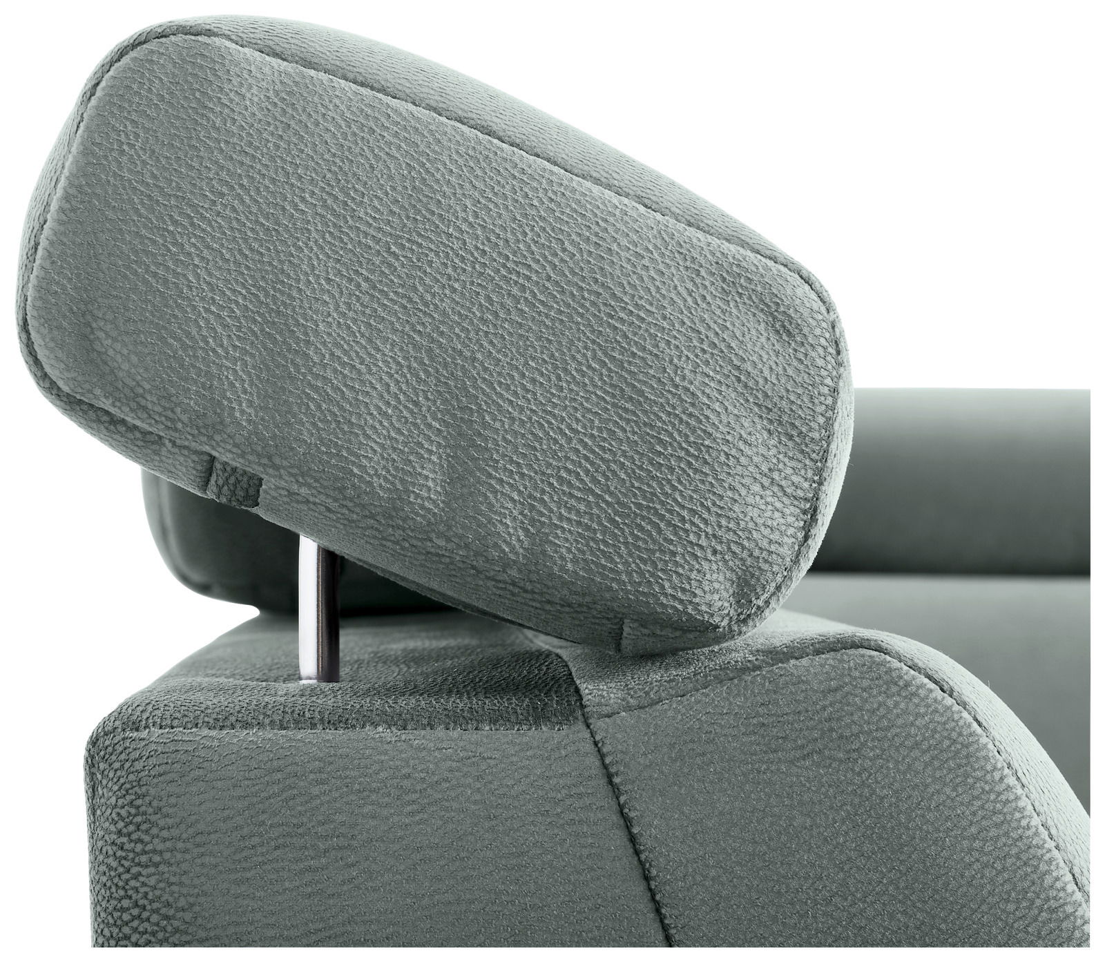 Nahaufnahme einer grünen Kopfstütze eines Sofas aus Stoff, seitliche Perspektive