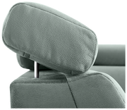 Nahaufnahme einer grünen Kopfstütze eines Sofas aus Stoff, seitliche Perspektive