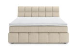 Frontale Ansicht eines beigen Boxspringbetts mit gestepptem Kopfteil und weißer Matratze.