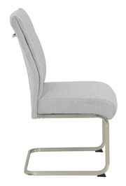 Moderner Schwingstuhl in hellgrauem Stoffbezug, seitliche Ansicht