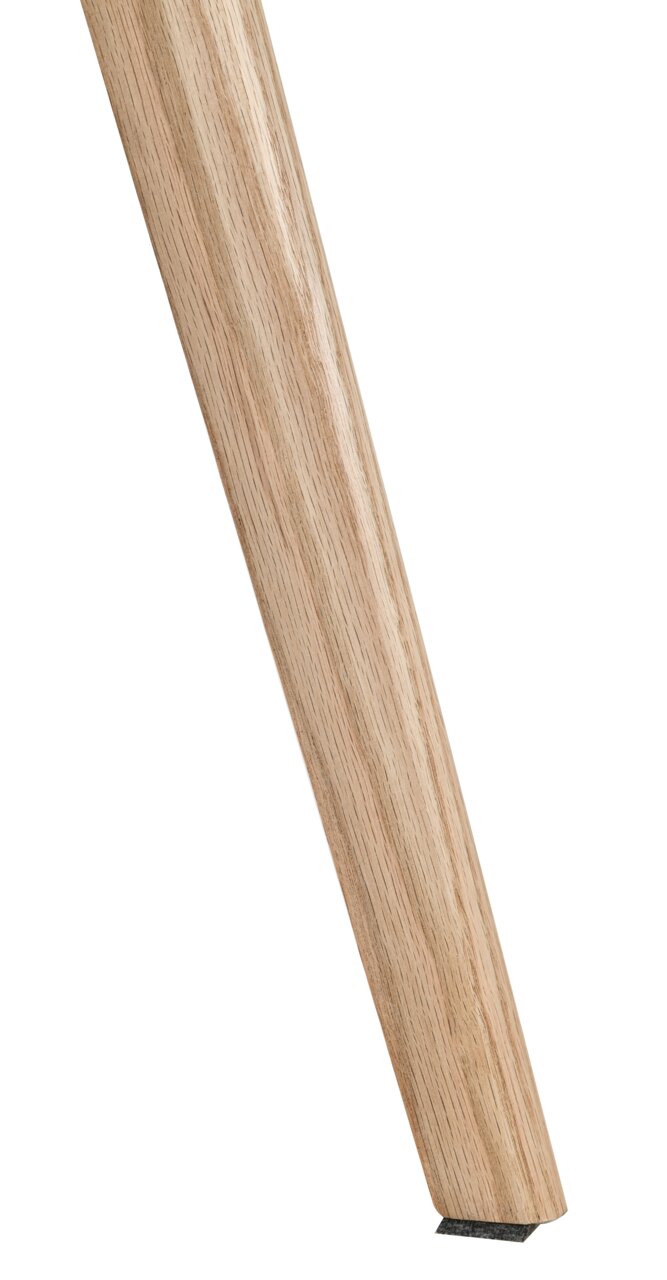 Nahaufnahme eines Stuhlbeins aus hellem Holz, schräg von der Seite fotografiert.