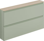 Hängeschuhschrank in hellem Grün mit Holzoberfläche, seitliche Perspektive