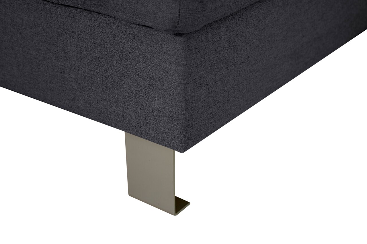 Nahaufnahme einer grauen Rundecke mit Metallfuß, seitliche Perspektive