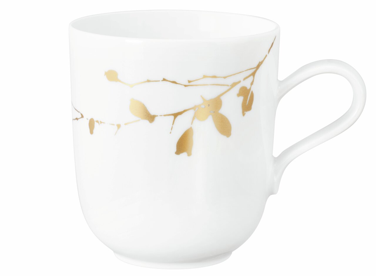 Weißer Becher mit Henkel und goldenen Verzierungen, seitliche Perspektive