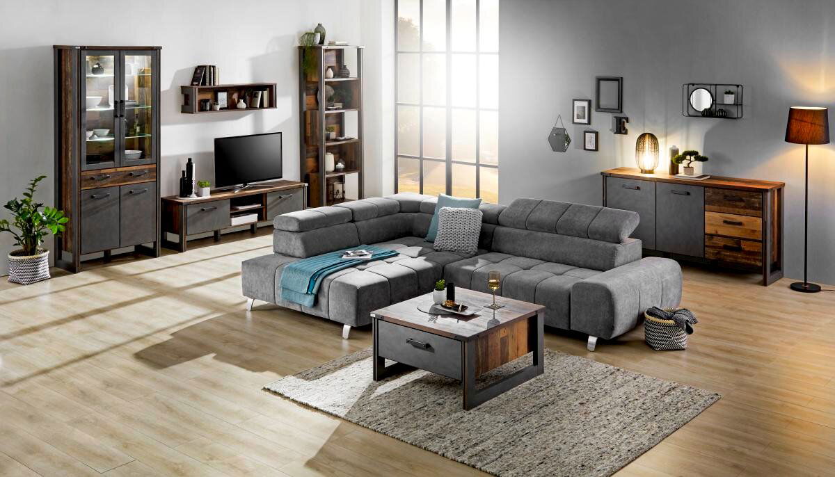 Graues Ecksofa TAIFUN mit Ottomane links in modernem Wohnzimmer, seitliche Perspektive