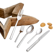 Elegantes Besteckset Viva 60-tlg. aus Edelstahl, bestehend aus Messer, Gabel, Löffel und Teelöffel, auf schwarzem Hintergrund mit Holzstern und Mandeln, aus der Vogelperspektive.