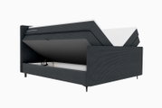 Boxspringbett mit hochgeklappter Matratze, seitliche Perspektive