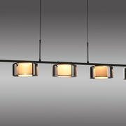 Moderne Pendelleuchte RIKA mit mehreren zylindrischen Lampenschirmen aus Glas, seitliche Perspektive