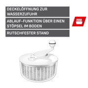 Weißer Salatschleuder-Deckel mit Wasserzufuhr-Öffnung, Ablaufstopfen im Boden und rutschfestem Stand, freigestellt vor weißem Hintergrund, Ansicht leicht von oben (3/4-Perspektive).
