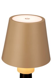 Nahaufnahme einer Akku-Tischleuchte in Beige mit einem runden, beleuchteten Schalter auf der Oberseite.