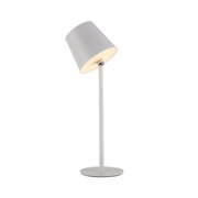 De BOTERIA-tafellamp op accu, gezien vanaf de zijkant, met een schuin aflopende lampenkap en een flessendop als accessoire.