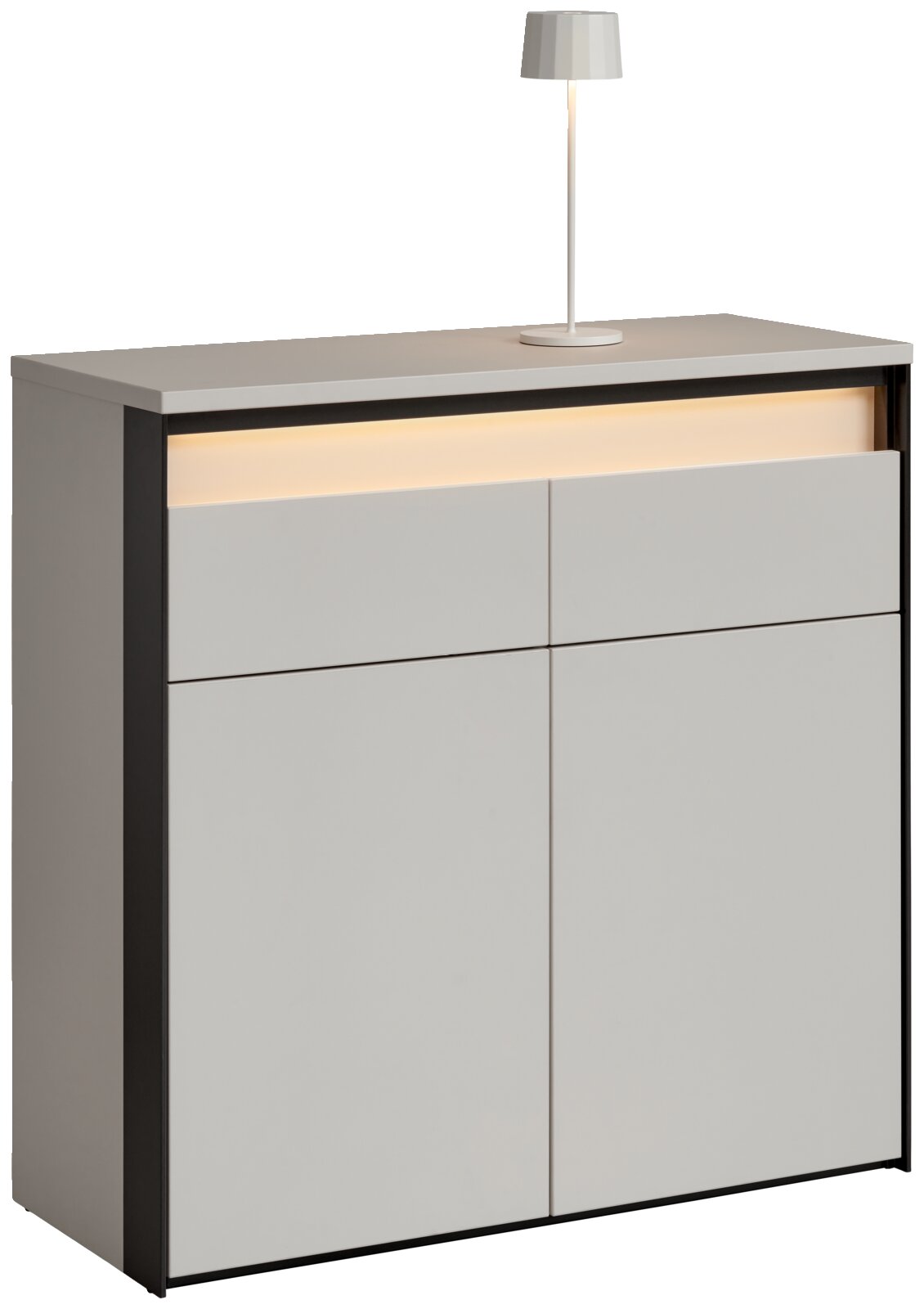 Moderne Kommode in Weiß mit schwarzem Rahmen, integrierter Beleuchtung und Tischlampe, seitliche Perspektive