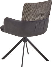 Moderner Polsterstuhl mit Armlehnen, dunkelgrauer Sitzschale und gemusterter Rückenlehne auf schwarzem Metall-Drehkreuz, Ansicht von hinten schräg rechts