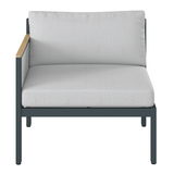 Frontansicht eines Lounge-Sofas mit linkem Armteil, grauem Polster und dunklem Rahmen.