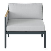 Vooraanzicht van een loungebank met een armleuning aan de linkerkant, grijze bekleding en een donker frame.
