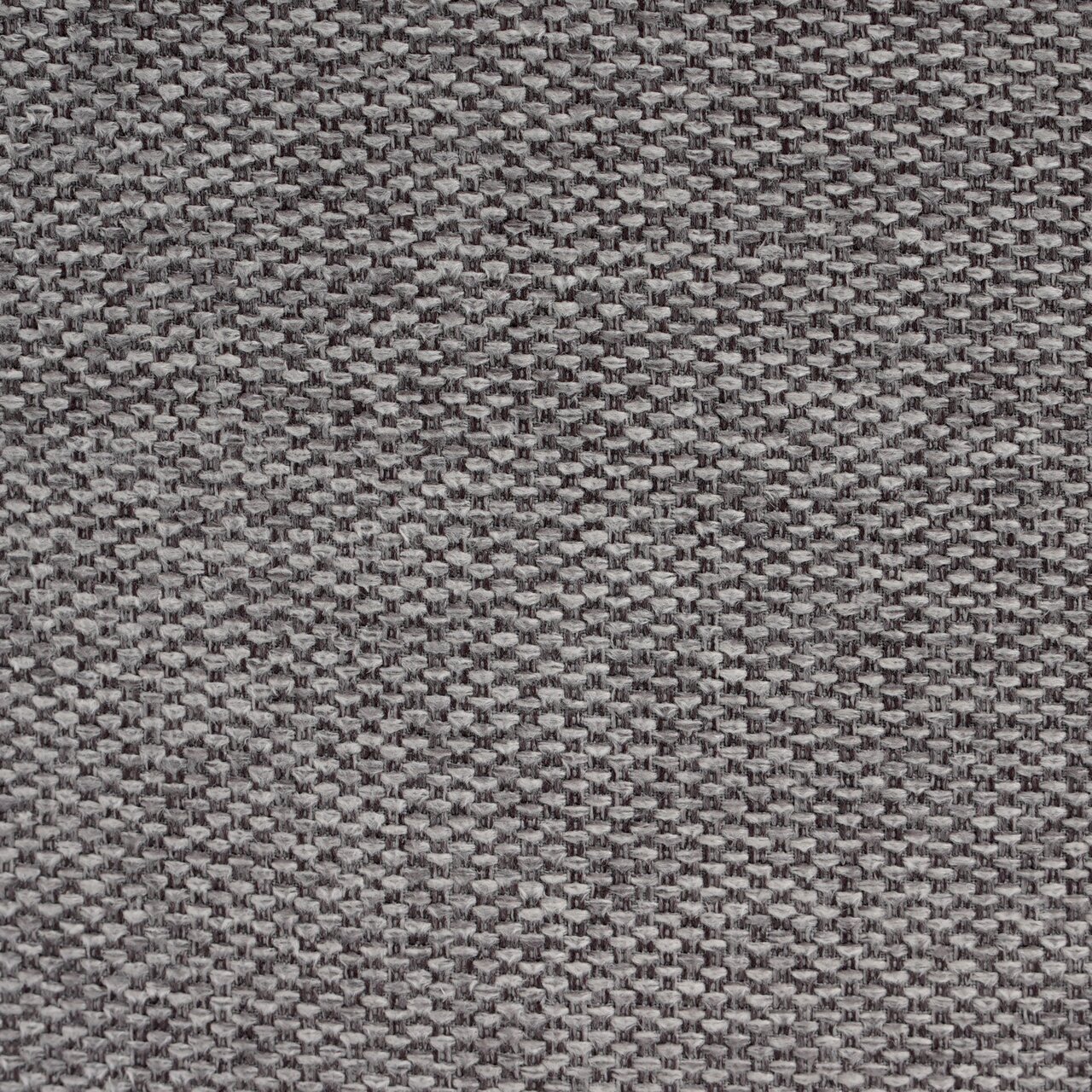 Nahaufnahme eines grauen, gewebten Stoffes mit strukturierter Oberfläche, von oben betrachtet.