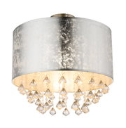 Elegante Deckenleuchte mit silbernem Schirm und hängenden Kristallen, seitliche Perspektive