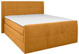 Boxspringbett 140 in senffarbener Polsterung, seitliche Perspektive