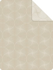 Beige jacquarddeken met cirkelvormig patroon, bovenaanzicht
