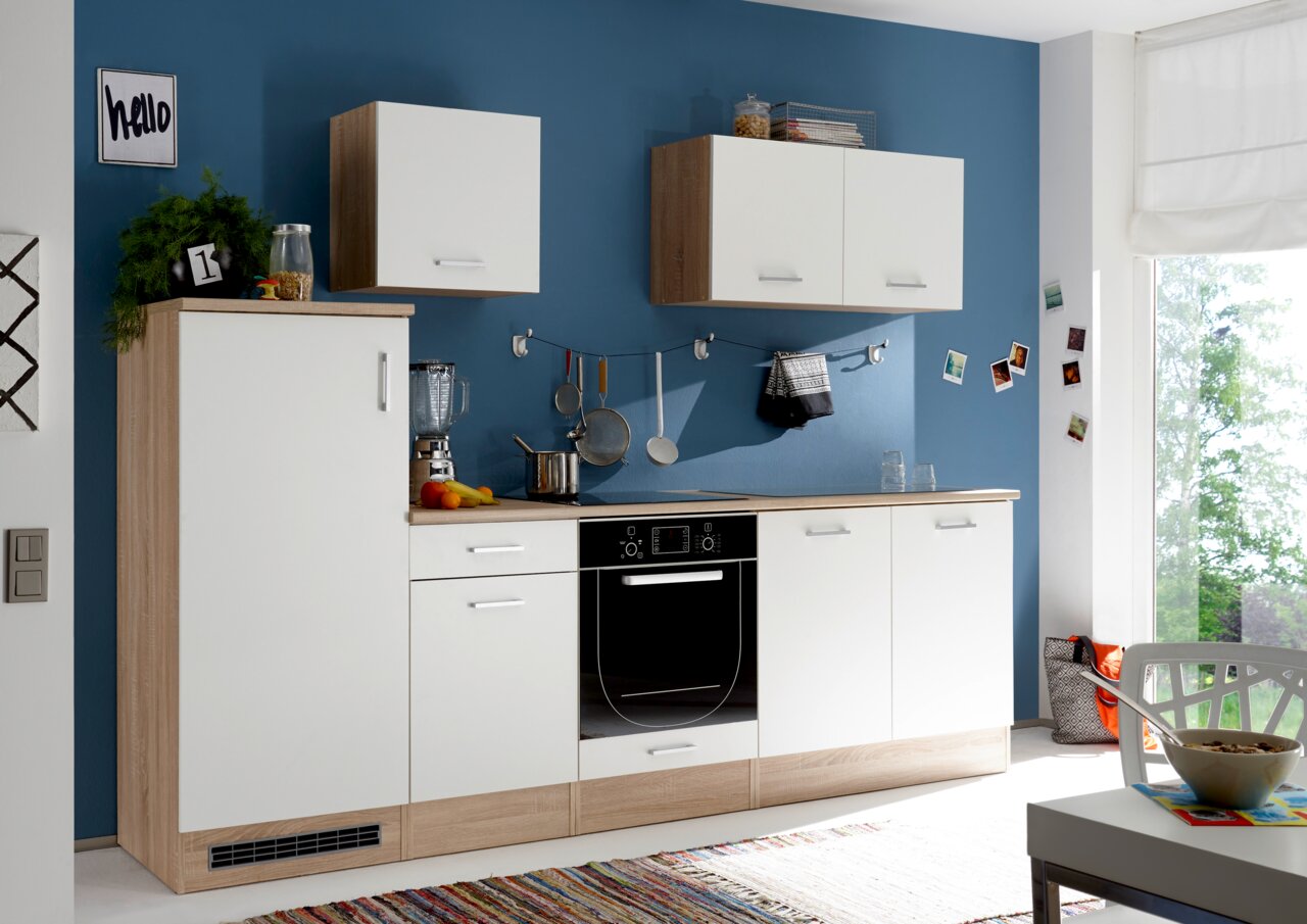 Yourkitchen Keukenblok 270 zonder elektrische apparaten ANDY Moderne keukenblok met witte en houtkleurige kasten, blauwe muur op de achtergrond, aanzicht van voren.