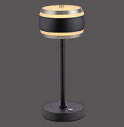 Moderne Akku-Tischleuchte in Schwarz mit zylindrischem Lampenschirm, seitliche Ansicht