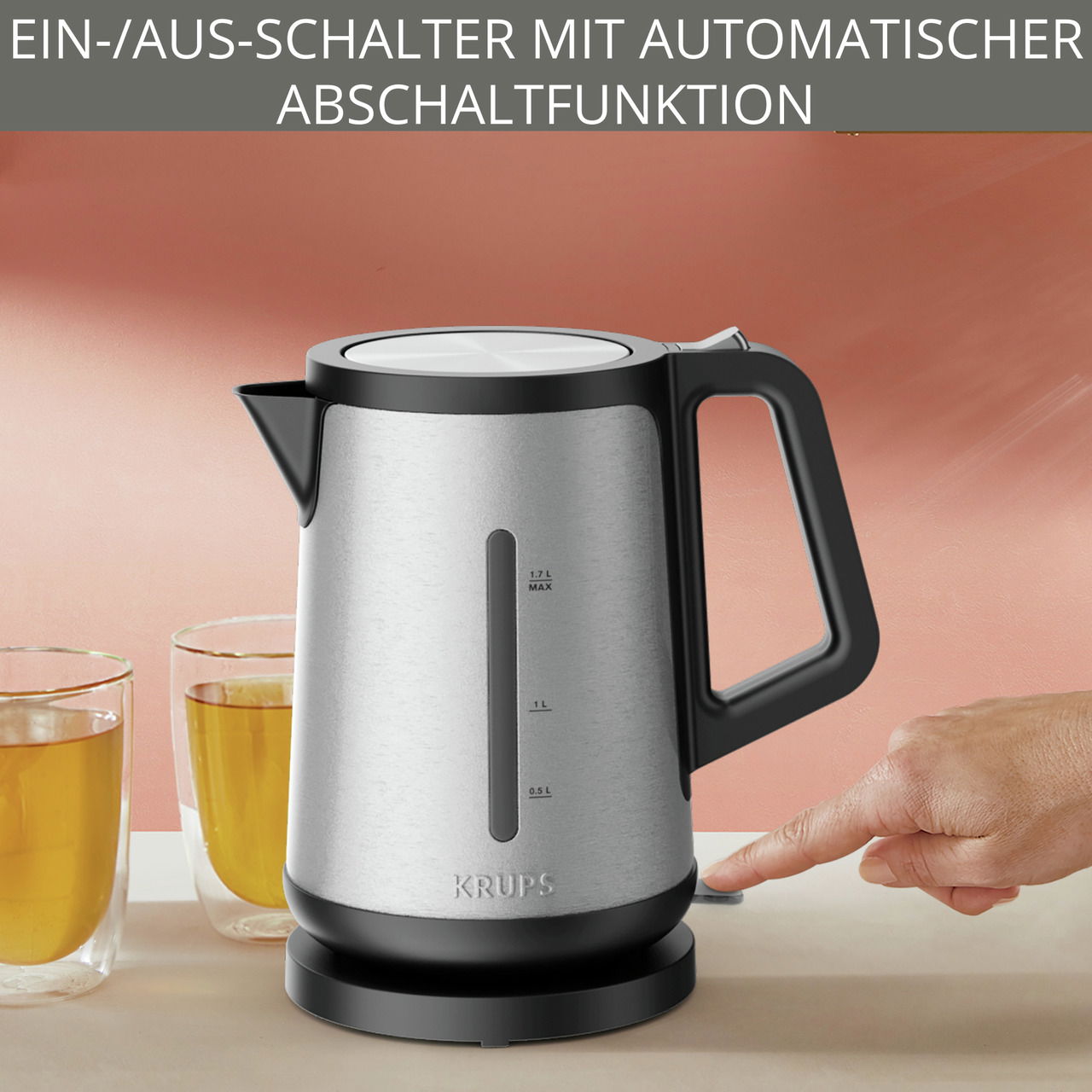 Moderner Wasserkocher aus Edelstahl mit Ein-/Ausschalter und automatischer Abschaltfunktion, seitliche Ansicht.