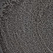 Nahaufnahme einer Oberfläche mit schwarzem und grauem, gesprenkeltem Muster.