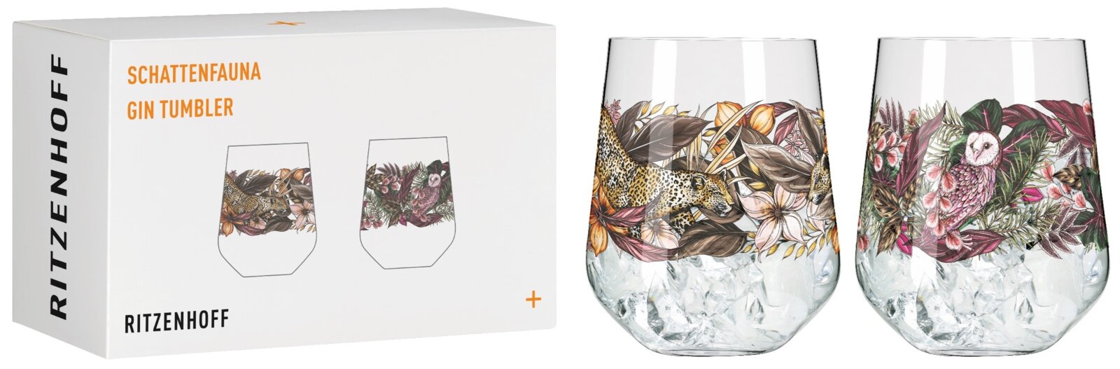 Twee gin-glazen met tropische dieren- en plantenmotieven, waaronder een luipaard en een uil, op een witte verpakking met het opschrift 'Schattenfauna Gin Tumbler'. Perspectief: vooraanzicht.