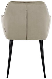 Rückansicht eines beigen Armlehnstuhls mit schwarzen Beinen