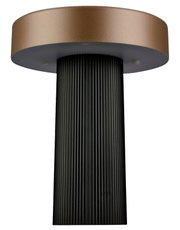 Moderne Tischleuchte mit geriffeltem schwarzem Fuß und rundem, bronzefarbenem Schirm, Ansicht von unten/leicht schräg von vorne