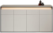 Vooraanzicht van een modern XL-dressoir met minimalistische lijnen en ingebouwde verlichting, versierd met vazen.