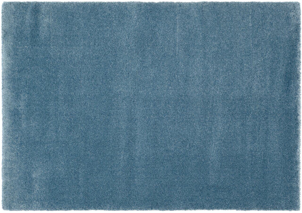 Blauer Uni-Teppich in Draufsicht, rechteckig und flauschig.
