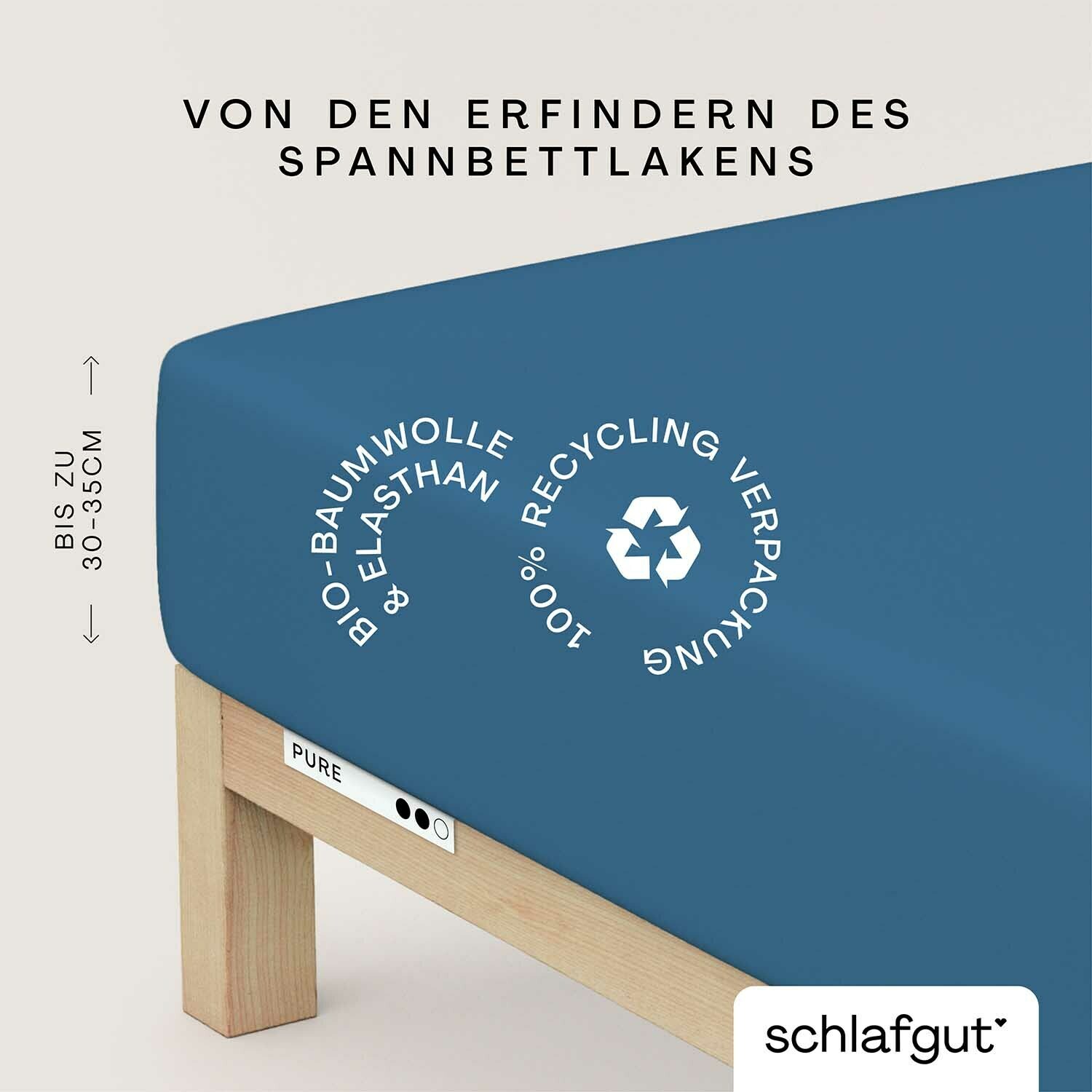 Blaues Spannbettlaken aus Bio-Baumwolle und Elasthan, geeignet für Matratzen bis zu 30-35 cm Höhe, mit Recycling-Verpackung, seitliche Perspektive.