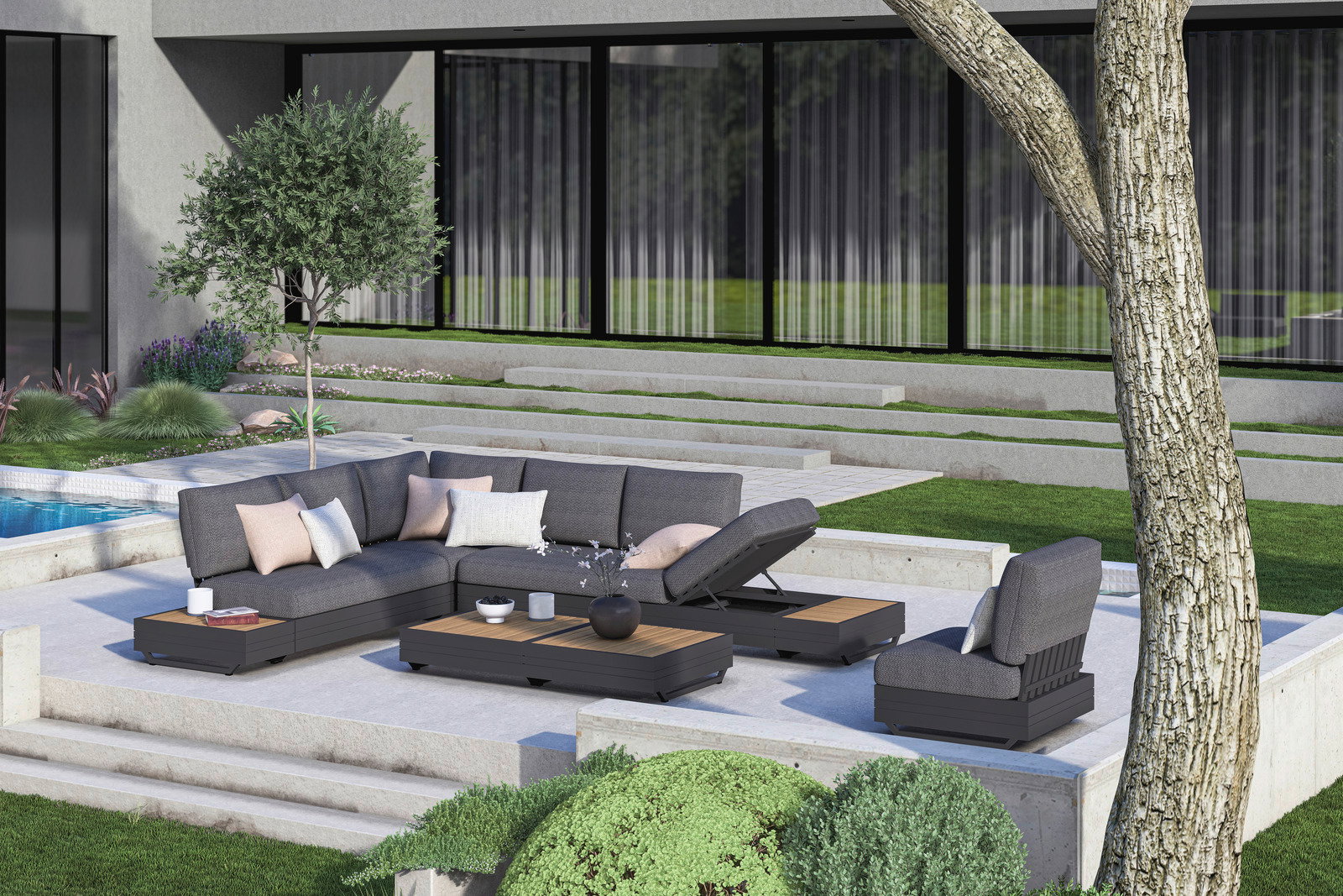 Moderne Outdoor-Lounge mit grauen Sitzmöbeln und Kaffeetischen auf einer Terrasse, umgeben von grüner Landschaft. Perspektive von schräg oben.