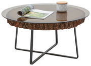 Runder Couchtisch mit Glasplatte und rustikalem Holzrand, auf schwarzem Metallgestell, aus seitlicher Perspektive fotografiert.