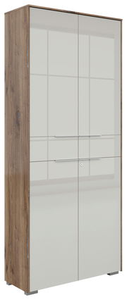 Zweiflügeliger Aktenschrank Voleo Nevada in Holzoptik mit weiß glänzenden Türen, seitliche Perspektive