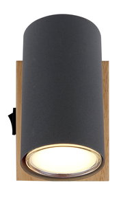 Zylindrischer Strahler aus dunkelgrauem Metall mit Holzrückplatte, frontal abgebildet.