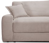 Beige Big-Sofa mit geripptem Stoffbezug, seitliche Perspektive