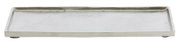Rechteckige, flache Metallschale in Silberoptik, frontal von der Seite fotografiert.