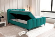 Boxbett mit aufklappbarem Stauraum in modernem Schlafzimmer, seitliche Perspektive