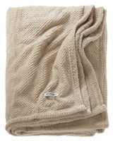 Beige gefaltete Decke von Tom Tailor, aus weichem Material mit sichtbarer Struktur, Draufsicht.