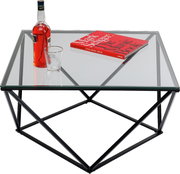 Moderner Beistelltisch mit Glasplatte und geometrischem Metallgestell, von oben fotografiert. Auf dem Tisch stehen eine Flasche, ein Glas und ein Buch.