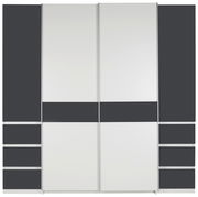 Moderner Dreh- und Schwebetürenschrank mit vier Türen in Weiß und Dunkelgrau, Frontalansicht.