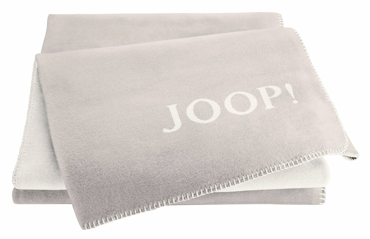 JOOP! Tagesdecke 150x200cm UNI-DOUBLEFACE Beige Decke mit JOOP! Logo, gefaltet, von oben betrachtet