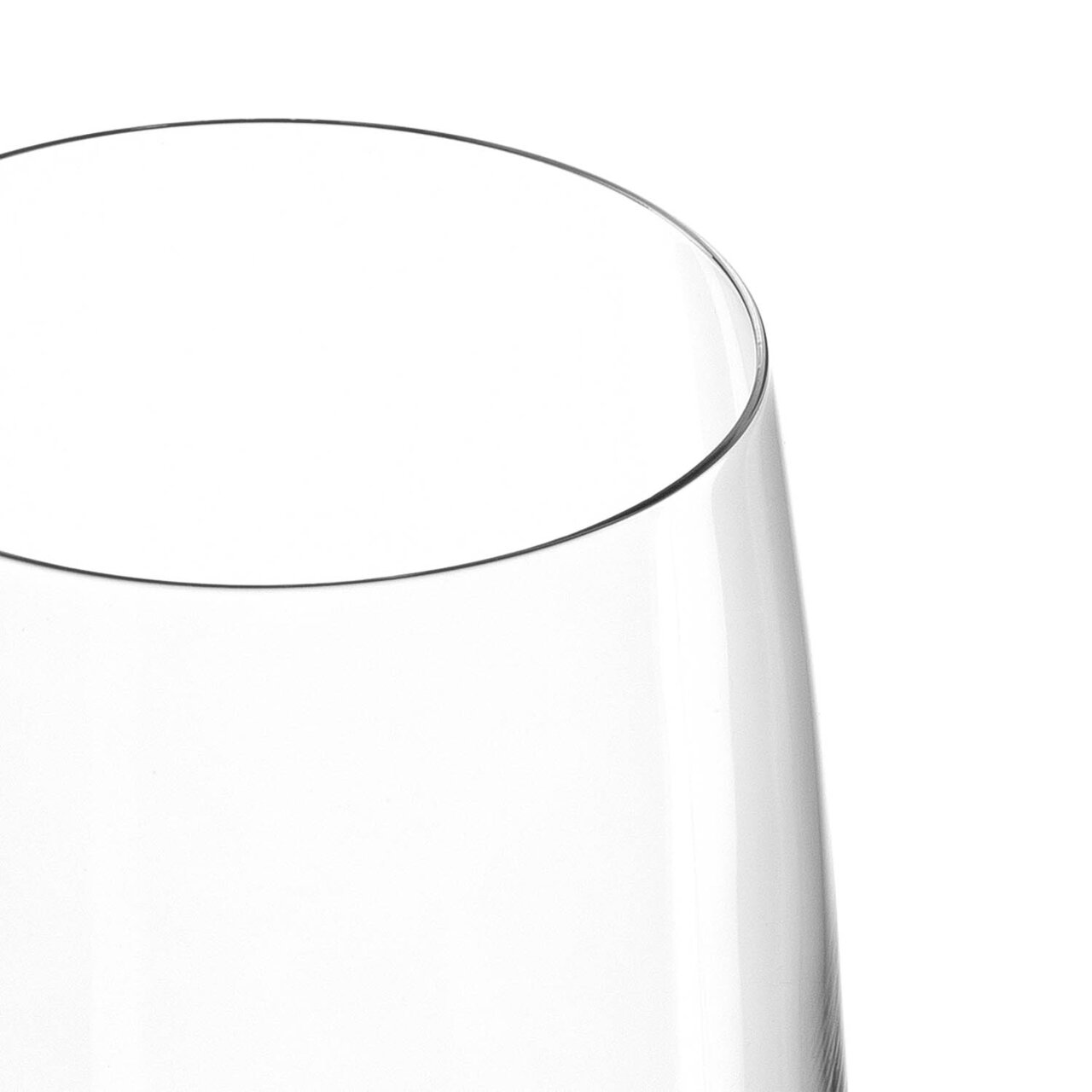 Close-up van een helder bierglas, van bovenaf gezien